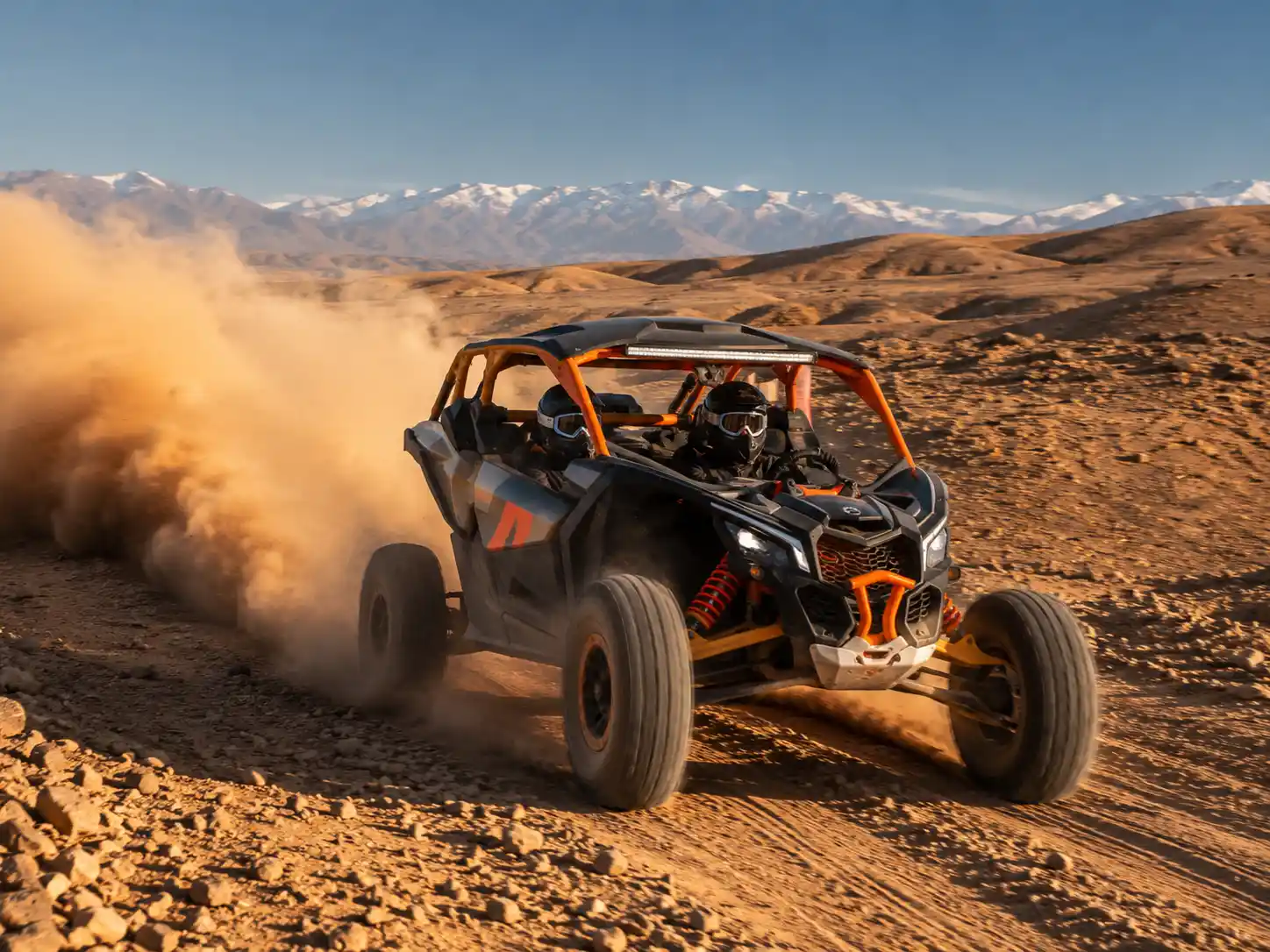 Buggy tour racing through sandy trails in Agafay Desert