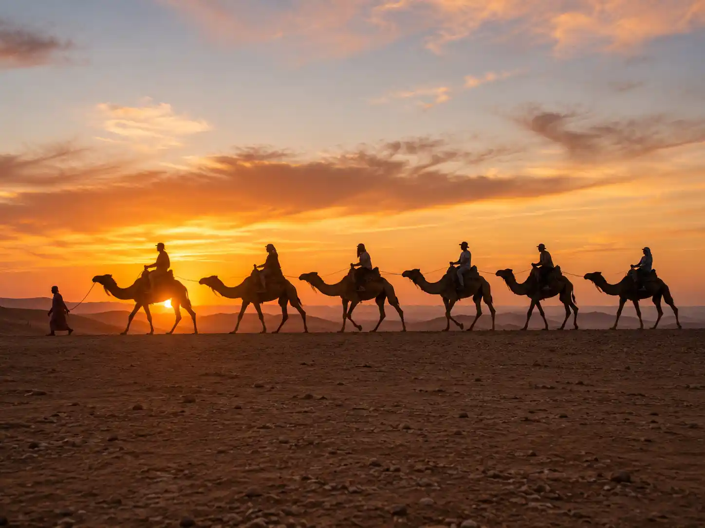 Camel ride caravan at sunset in Agafay Desert Morocco